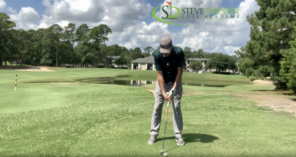 Setting Up For An Iron Shot by Steve Dresser, PGA